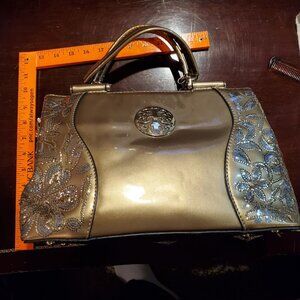Large gold handbag